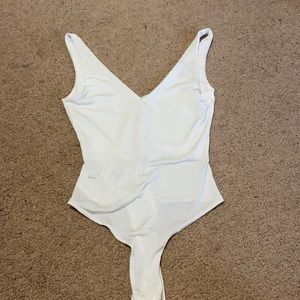 misguided white bodysuit